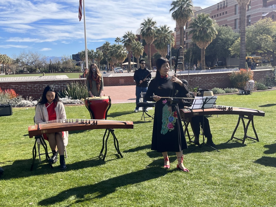 Students playing traditional Chinese instruments