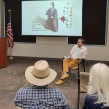 UA Professor discussing a Japanese film.